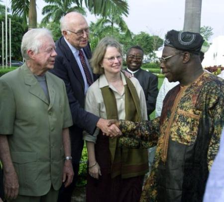 Bill Gates Sr., wife Mimi, former President Jimmy Carter, Nigerian President Olusegun Obasanjo, Presidential Villa, Abuja, Nigeria, March 9, 2002.