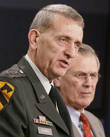 Commander of U.S. Forces in Afghanistan Army General Tommy Franks and Secretary of Defense Donald Rumsfeld