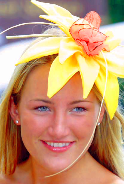 A girl wearing a hat, the Royal Ascot meeting, Berkshire, June 19, 2002.
