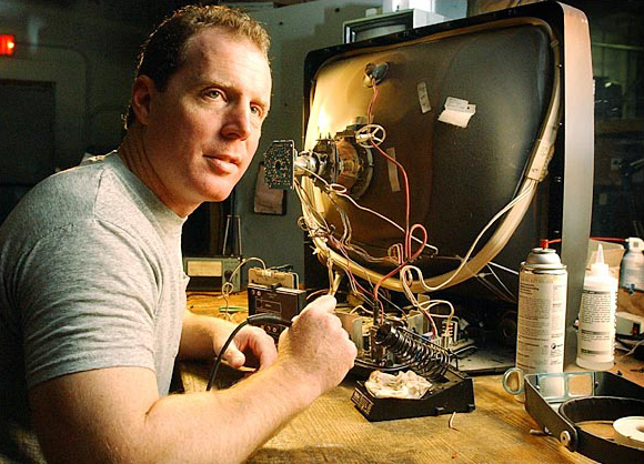 Television repairmen Adam Goldman in his shop, Blackwood, New Jersey, June 2003.