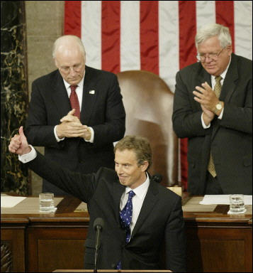 British Prime Minister Tony Blair gives a thumbs-up after speaking to a joint session of Congress as Vice President Dick Cheney and House Speaker Dennis Hastert applaud, Capitol Hill, July 17, 2003