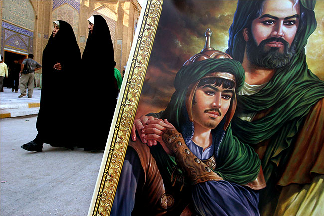 A poster shows Imam Ali, whose assassination led to the founding of Shiism, with his son Imam Hussein, a Shiite martyr, Najaf, October 2003.