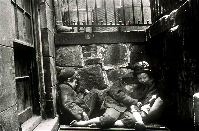 An 1888 photograph of New York children, by Jacob Riis (from the exhibition Children at Risk Protecting New York City's Youths, 1653-2003), New York Historical Society, November 2003.