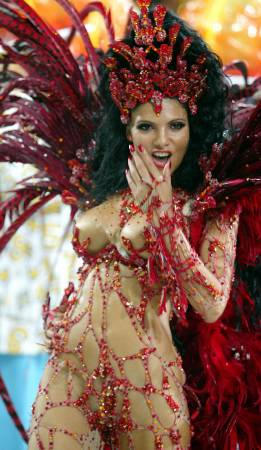 Model Fabia Borges leads the percussion section of the Unidos da Tijuca samba school up the avenue at the Sambodrome, during the Rio de Janeiros annual Carnival first night of competition for the 'elite' group, February 22, 2004.