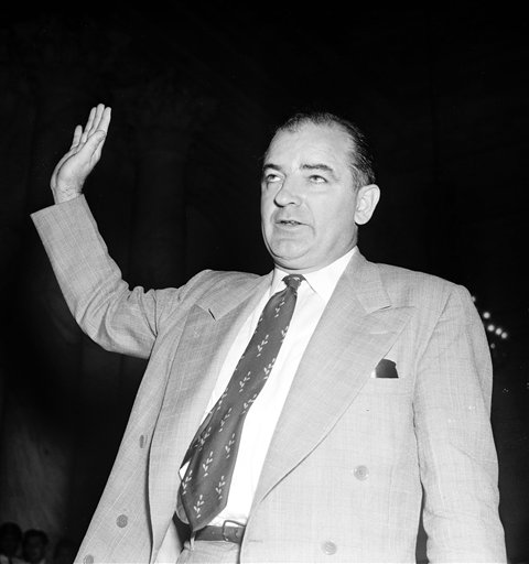 Senator Joseph R. McCarthy, R-Wisconsin, takes the witness stand to testify at the Army-McCarthy 36-day hearings, which have been called 'the first great made-for-TV political spectacle,' and helped to turn the tide of public opinion against his brutal and truculent interrogative tactics, Washington, June 9, 1954.