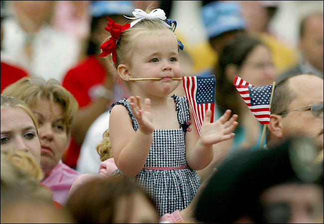 Halie Harrison Meyer, 2, whose uncle, a U.S. soldier, was killed in Iraq in April, was among thousands who attended President Bush's Memorial Day address at Arlington National Cemetery, Washington, May 31, 2004.