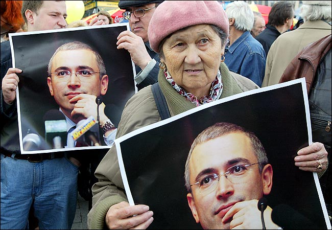 A group of Russians protest holding pictures of the industrialist Mikhail B. Khodorkovsky and demanding his release from jail, Moscow, May 2004.