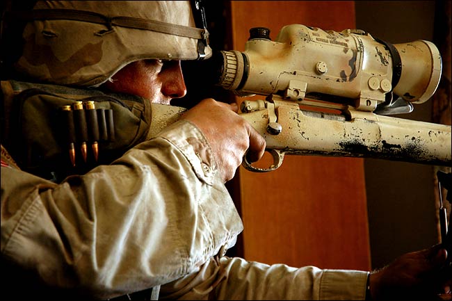 An Army sniper fired at members of Moqtada a-Sadr's militia, the Mahdi Army, Karbala, May 17, 2004.