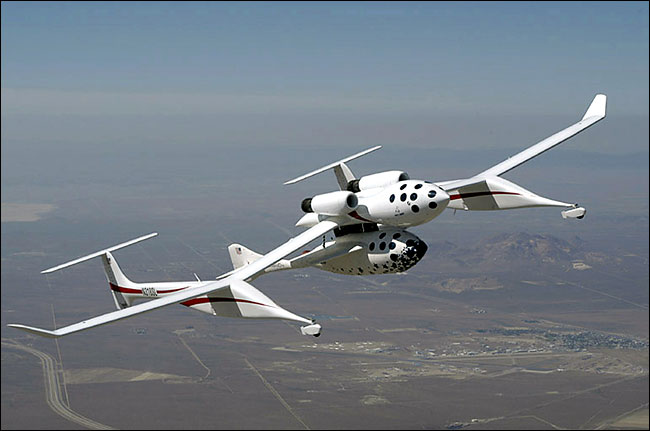 SpaceShipOne, attached to the belly of a sleek plane called the White Knight, took off shortly after 6:30 a.m., June 21, 2004 on a mission to make the first privately financed manned spaceflight. When the plane reached an altitude of 50,000 feet, it dropped the smaller craft, and its pilot, Michael W. Melvill, 63, started the rocket that took him up to the beginnings of space, reached 328,491 feet - just 400 feet beyond the goal, an altitude of 100 kilometers. He then brought SpaceShipOne back to earth as a glider, touching down at 8:15.