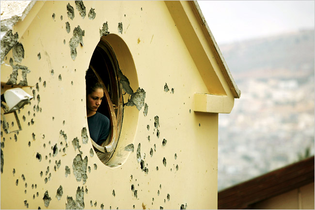 A house slightly damaged by a Hezbollah rocket, Carmiel, Israel, July 15, 2006.