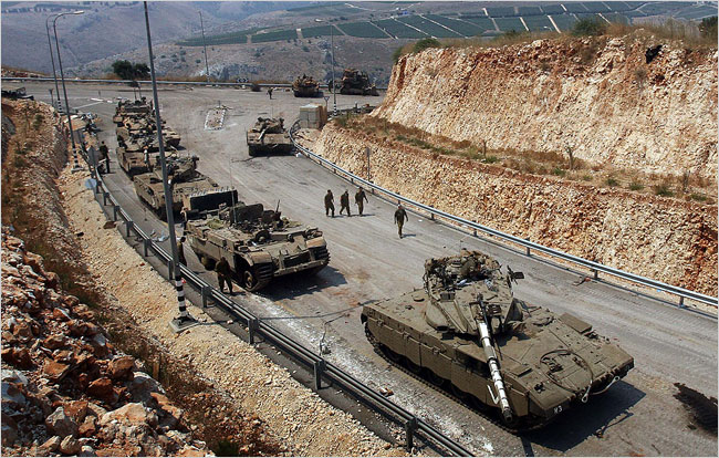 Israeli tanks lined up along a road near the Israeli town of Avivim, near the Lebanese border, July 21, 2006.