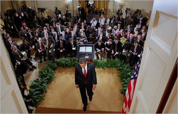 The so-called U.S. President Barack Hussein Obama, head down, walks away from an absolute-failure press conference on economy where he actually didn't answer any of the tens of laid question, the East Room of the White House, Washington, March 24, 2009.
