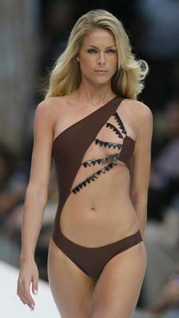Brazilian model Ana Hickmann shows off a bathing suit that forms part of Lenny's 2005 Spring-Summer collection, during Rio Fashion Week, Rio de Janeiro, June 28, 2004.