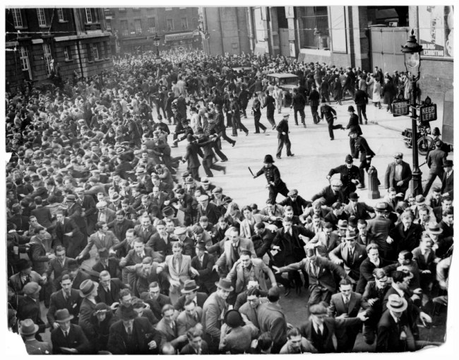 Crowd gather to attend the Black Shirts assembling for the Facist march led by Oswald Mosley through the East End and known as The Battle of Cable Street, London, October 4, 1936.