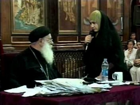 Father Makary Yunan during one of his services usually attended by many Muslim women, c. 2009, Cairo, Egypt.
