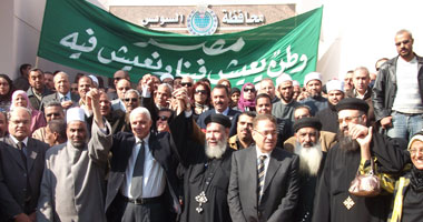 National Democratic Party members demonstrate against Islamic terrorism five days after Alexandrias Two Saints Church have been bombed, Suez, Egypt, January 6, 2011.