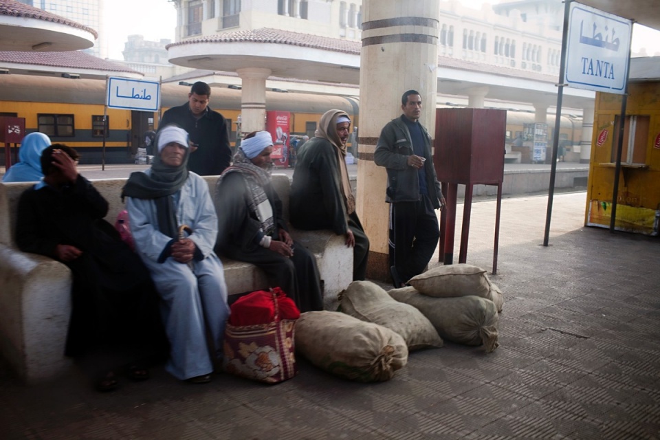Passengers wait in Tanta, a city between Alexandria and Cairo, early February 2011.