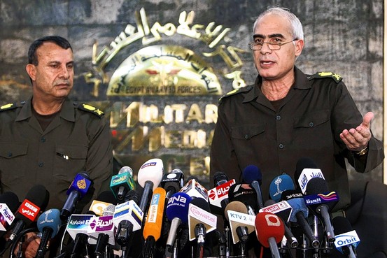 General Mamdouh Shaheen, right, with General Ismail Etman, members of the military council, at a news conference, Cairo, March 28, 2011.