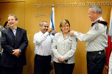 ‎Defense Minister Ehud Barak looks on as Israel's First-Ever Female Major General Orna Barbibay receives new ranks from Chief of Staff Lt. General Benny Gantz and her husband, June 23, 2011.

النقاش هنا
https://www.facebook.com/EveryScreen/posts/381089048631755‎