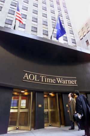 The first day for the new AOL Time Warner sign, Time Warner headquarters, New York, January 12, 2001.