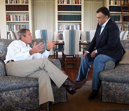 U.S. President George W. Bush and Saudi Arabian ambassador Prince Bandar bin Sultan, Bush Ranch, Crawford, Texas, August 27, 2002.