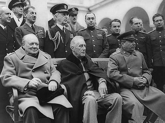 British Prime Minister Winston Churchill, along with U.S. President Franklin Roosevelt and Soviet Leader Joseph Stalin, attend the conference at Yalta. February 1945.