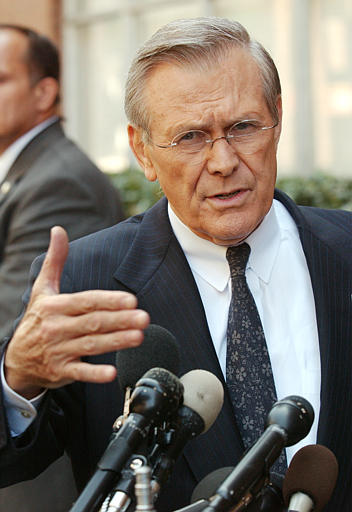 Secretary of Defense Donald Rumsfeld speaks to the press after appearing on CBS's 'Face the Nation,' Washington, March 23, 2003.