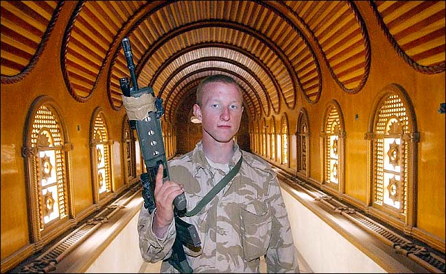 British Royal Marine Stuart Lawley, a corridor of Saddam Hussein's Palace, Basra, April 7, 2003.