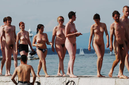 Naked anti-globalisation protesters chant slogans against globalisation and the G8-summit in Evian, Geneva, May 31, 2003.