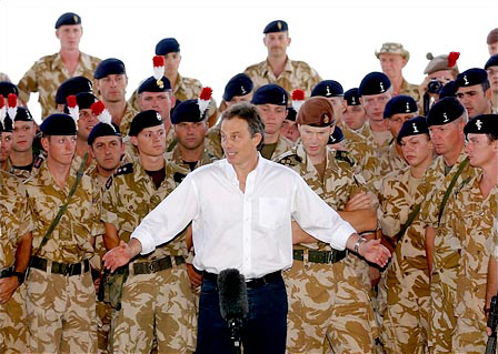 Prime Minister Tony Blair of Britain, the first foreign leader to visit postwar Iraq, addresses his troops, Basra, May 29, 2003.