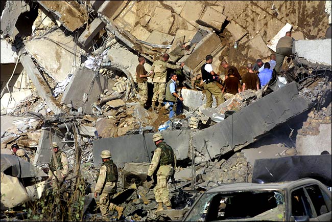 A suicide bomber detonated a truck full of explosives at the United Nations compound, killing at least 23 people, including the top United Nations representative in Iraq, Sergio Vieira de Mello, Baghdad, August 19, 2003.