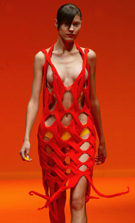 A model wears a creation as part of the Ines Valentinisch Spring-Summer women's collection 2004, Milan fashion show, September 30, 2003.