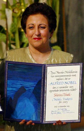 Iranian activist Shirin Ebadi holds the diploma for the 2003 Nobel Peace Prize during a ceremony in Oslo's City Hall, December 10, 2003.