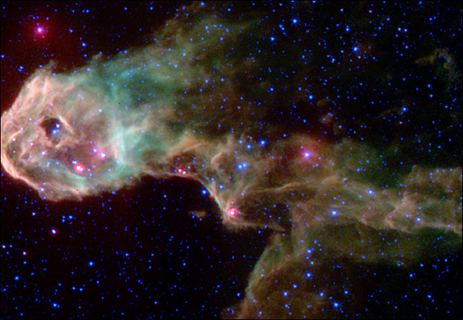 One of the first pictures from the Spitzer Space Telescope, part of a program designed to paint a more comprehensive picture of the cosmos using different wavelengths of light. Pictures unveiled by NASA in December 18, 2003.
