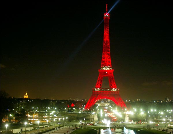 As part of France's 'Year of China' promotion, the Eiffel Tower was bathed in red lights to mark the Asian new year, January 2003.