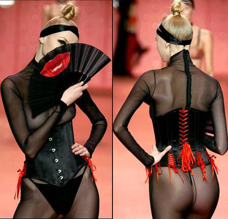 A model poses during French designer Chantal Thomass' for her 2004 lingerie collection, Paris, January 22, 2004.