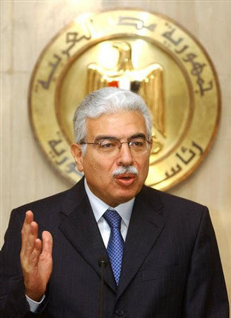 Egypt's new Prime Minister Ahmed Nazief speaks during a news conference, after Egyptian President Hosni Mubarak swore in a new Cabinet, July 14, 2004.