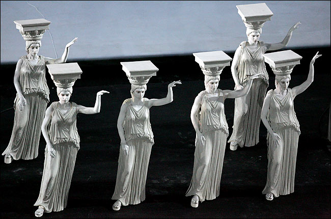 During the Athens 2004 Olympic Games opening ceremony, a procession of figures from Greek history were represented by actors in marble-like costumes, from ancient mythological characters to a tribute to the Greek shepherd, Spiros Louis, who won the first Olympic marathon, August 13, 2004.