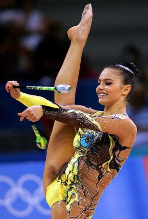 Russia's Alina Kabaeva, who won the gold medal, performs with clubs during the final of the individual all-around Rhythmic Gymnastic at the 2004 Olympic Games in Athens, August 29, 2004.