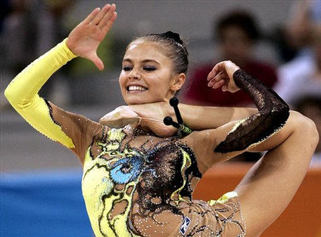 Russia's Alina Kabaeva, who won the gold medal, performs with clubs during the final of the individual all-around Rhythmic Gymnastic at the 2004 Olympic Games in Athens, August 29, 2004.