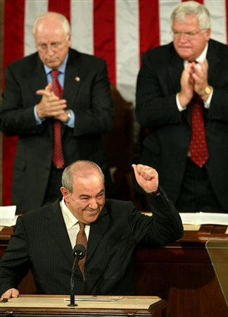 Iraq's interim Prime Minister Ayad Allawi Iraq's interim Prime Minister Ayad Allawi is applauded at rear by Vice President Dick Cheney, left, and Speaker of the House of Representatives Dennis Hastert, R-Ill, as he declares before a joint meeting of Congress that his country is moving successfully past the war that ousted Saddam Hussein and vows that elections will take place next year as scheduled, at the Capitol in Washington, September 23, 2004.
