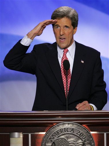 Democratic presidential candidate John Kerry salutes and says he is 'reporting for duty' before accepting the party's nomination at the Democratic National Convention, Boston, July 29, 2004.