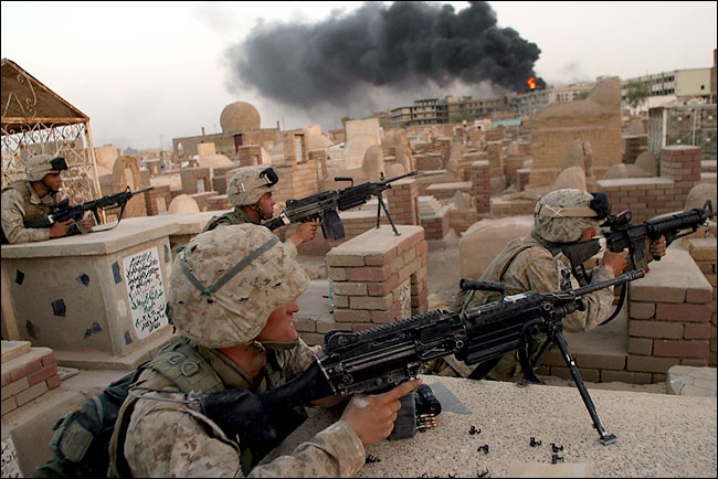 Marines of the 11th Marine Expeditionary Unit, the second day of advance in the Najaf cemetery, formerly a sanctuary for militiamen, August 6, 2004.


American marines launched a raid against rebels in Najaf, early August 9, 2004.