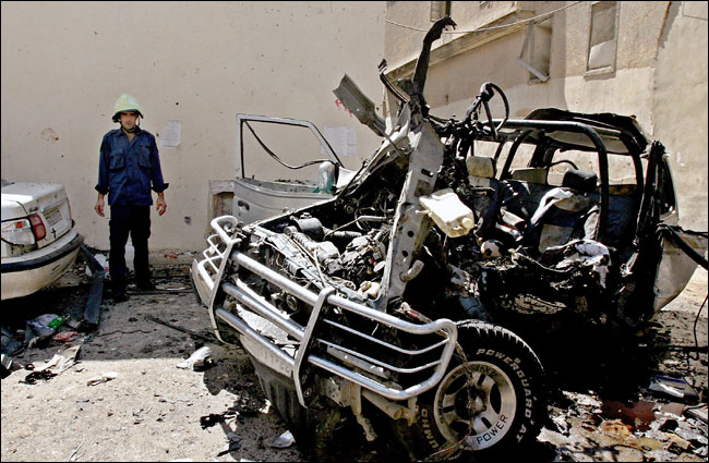The bombed-out vehicle in which Izzideen a-Sheikh Khalil, a Hamas official, died, Damascus, September 26, 2004.