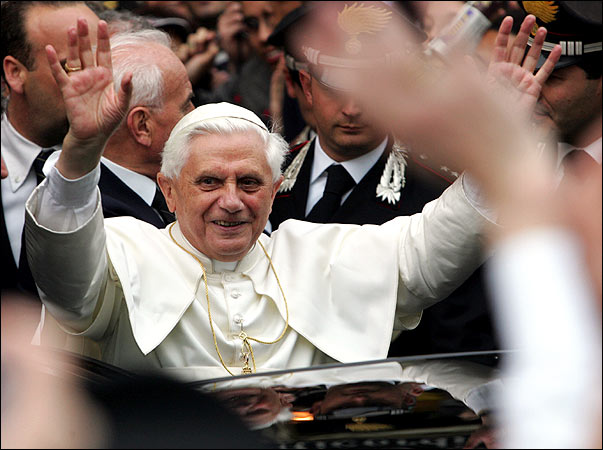 Pope Benedict XVI greets a crowd of well-wishers as he made a quick visit to his former home in Rome a few blocks from the Vatican, April 20, 2005.