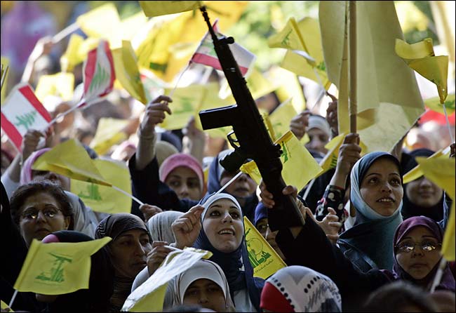 Hezbollah supporters with toy guns at a parliamentary elections rally in Baalbek, Lebanon, June 10, 2005.
