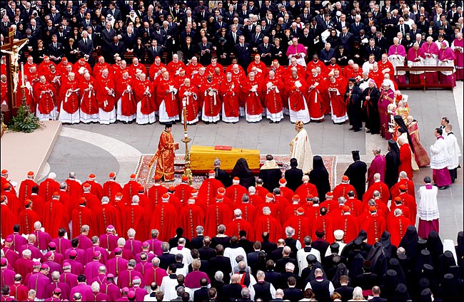 Patriarchs of the Eastern Catholic Church wave incense over the coffin of Pope John Paul II in front of royalty, political power brokers from around the world attending the funeral mass, front of St. Peter's Basilica at the Vatican, April 8, 2005.