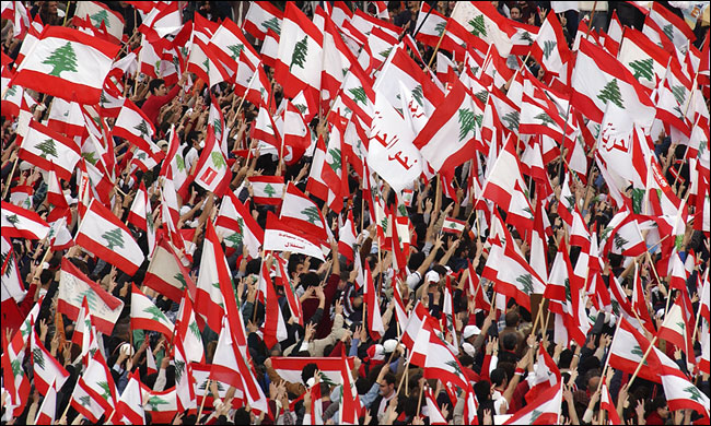When news of Mr. Karami's resignation reached the crowds, a cheer erupted throughout the square where they had gathered, Beirut, Lebanon, February 28, 2005.