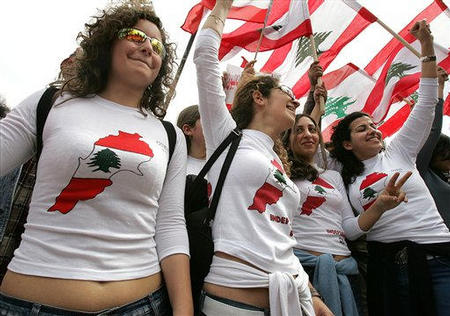 Anti-Syria Lebanese opposition protesters celebrate in an anti-Syria demonstration in Martyr's Square in central Beirut, Lebanon, March 6, 2005, a day after Syrian President Bashar al-Asad announced a Syrian troop pull back from Lebanon.