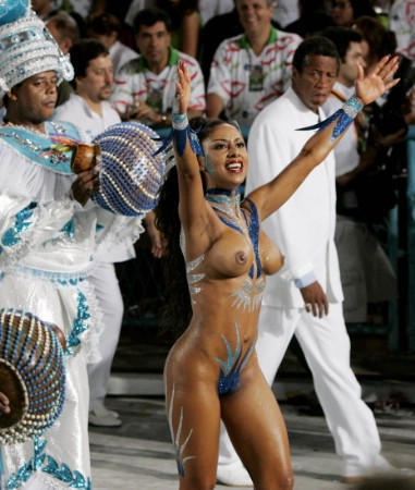 A performer from the Portela samba school dances in Rio de Janeiro's premier Carnival parade, February 8, 2005.